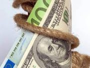 По каким курсам банки обменивают валюту?